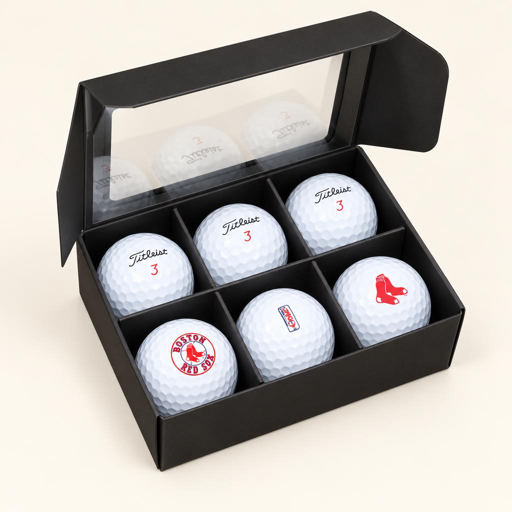 Black gift box holding six custom golf balls
