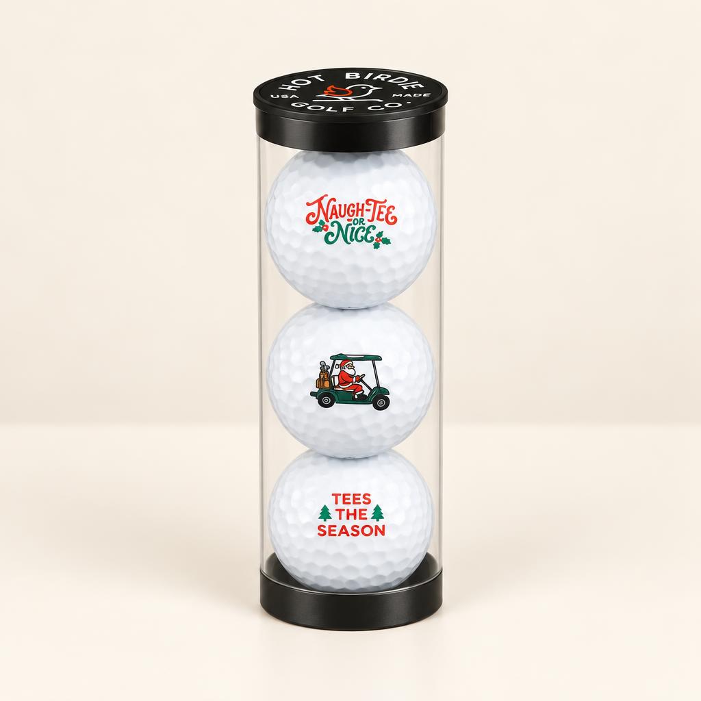 Two holiday golf balls printed Tees the Season and Naugh-Tee or Nice
